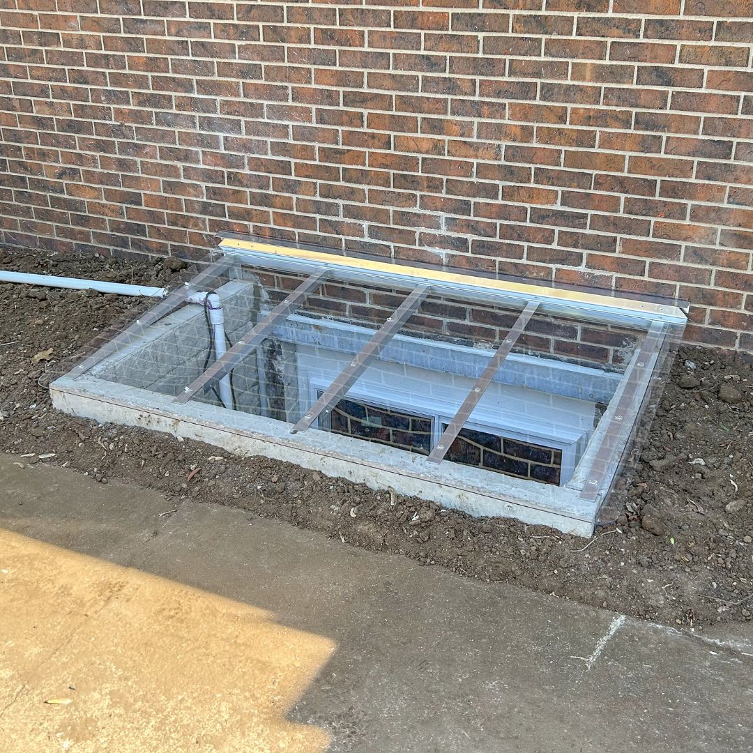 Illumicast egress window well