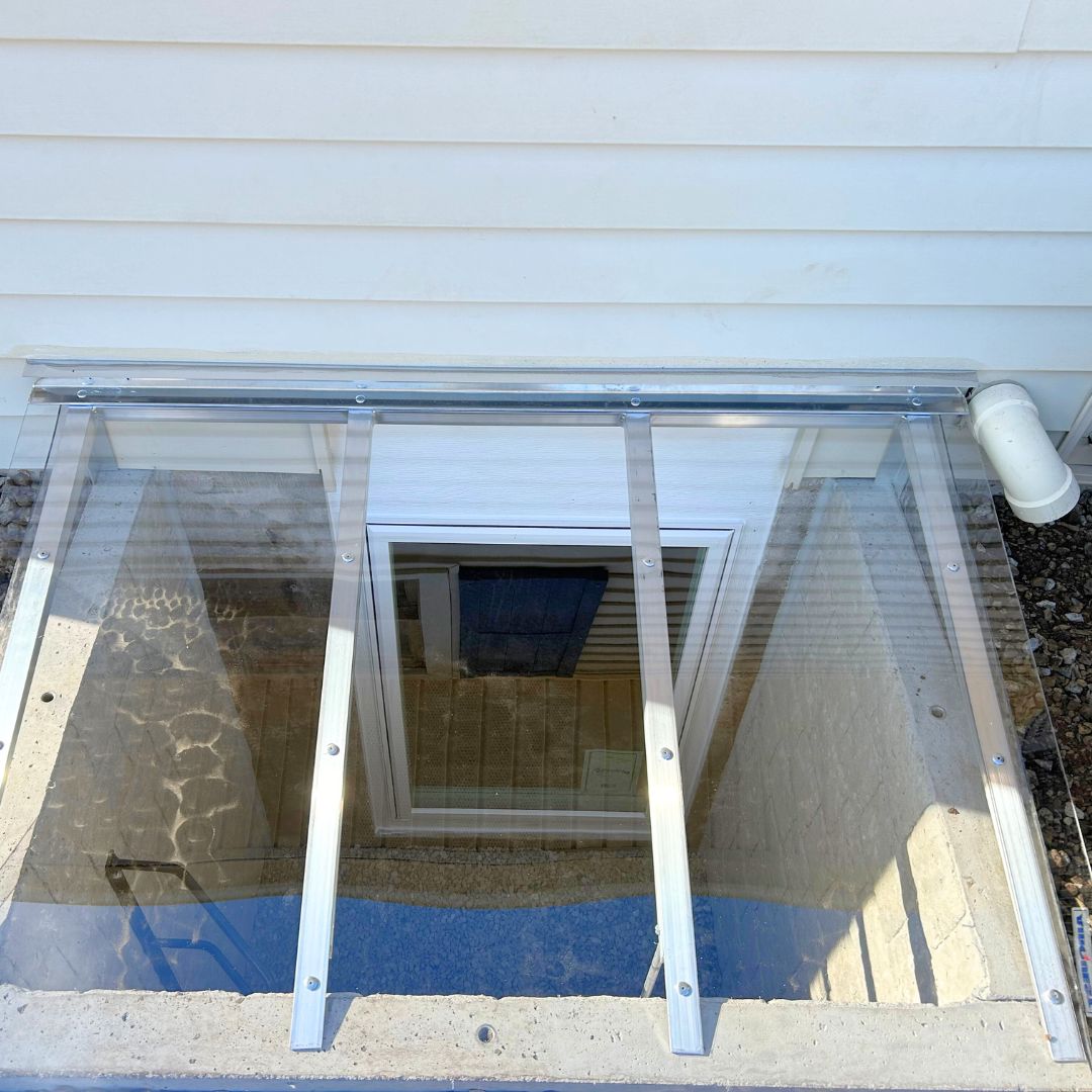 Illumicast egress window well installer Hutchinson, Kansas